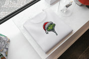 Foto di - T-shirt Ricamata Unisex – 100% Cotone – Stile Streetwear e Confortevole – Grinch Apre la Zip-Ricamati-Biiply